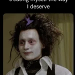 Person sitting with a reflective expression representing emotional awareness, burnout, and the deeper reality of self-care beyond surface-level habits